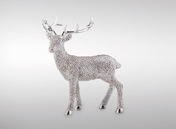 Rentier klein<br>stehend links blickend<br>